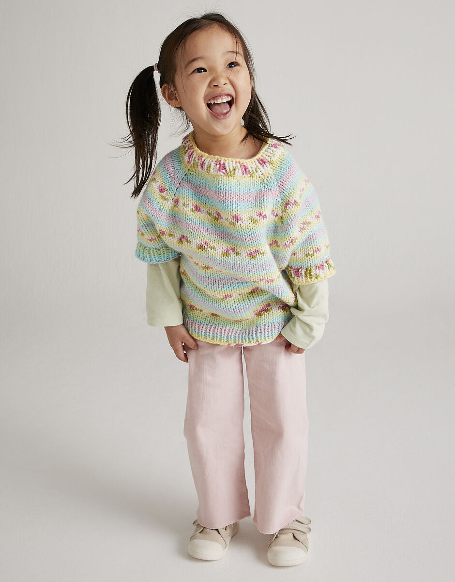 Knitting Pattern 5570 - NEW BLOOMS PONCHO AND HAT IN HAYFIELD BABY BLOSSOM CHUNKY