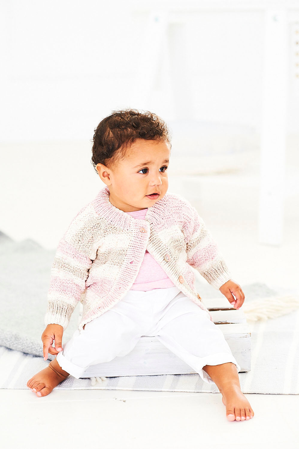 Knitting Pattern 9744 - Sweater and Cardigan in Bambino Prints DK