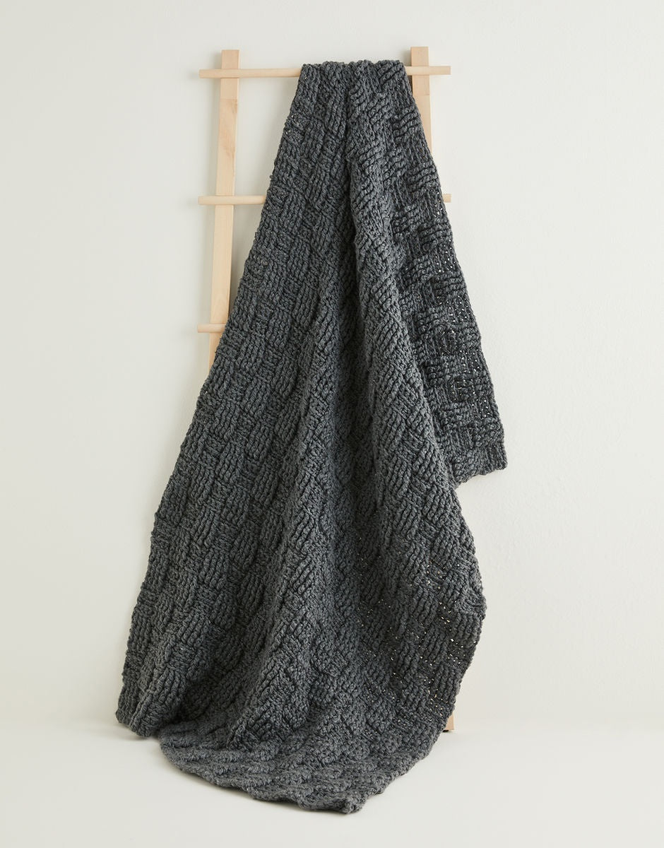 Knitting Pattern 10230 - BASKETWEAVE BLANKET IN HAYFIELD BONUS SUPER CHUNKY