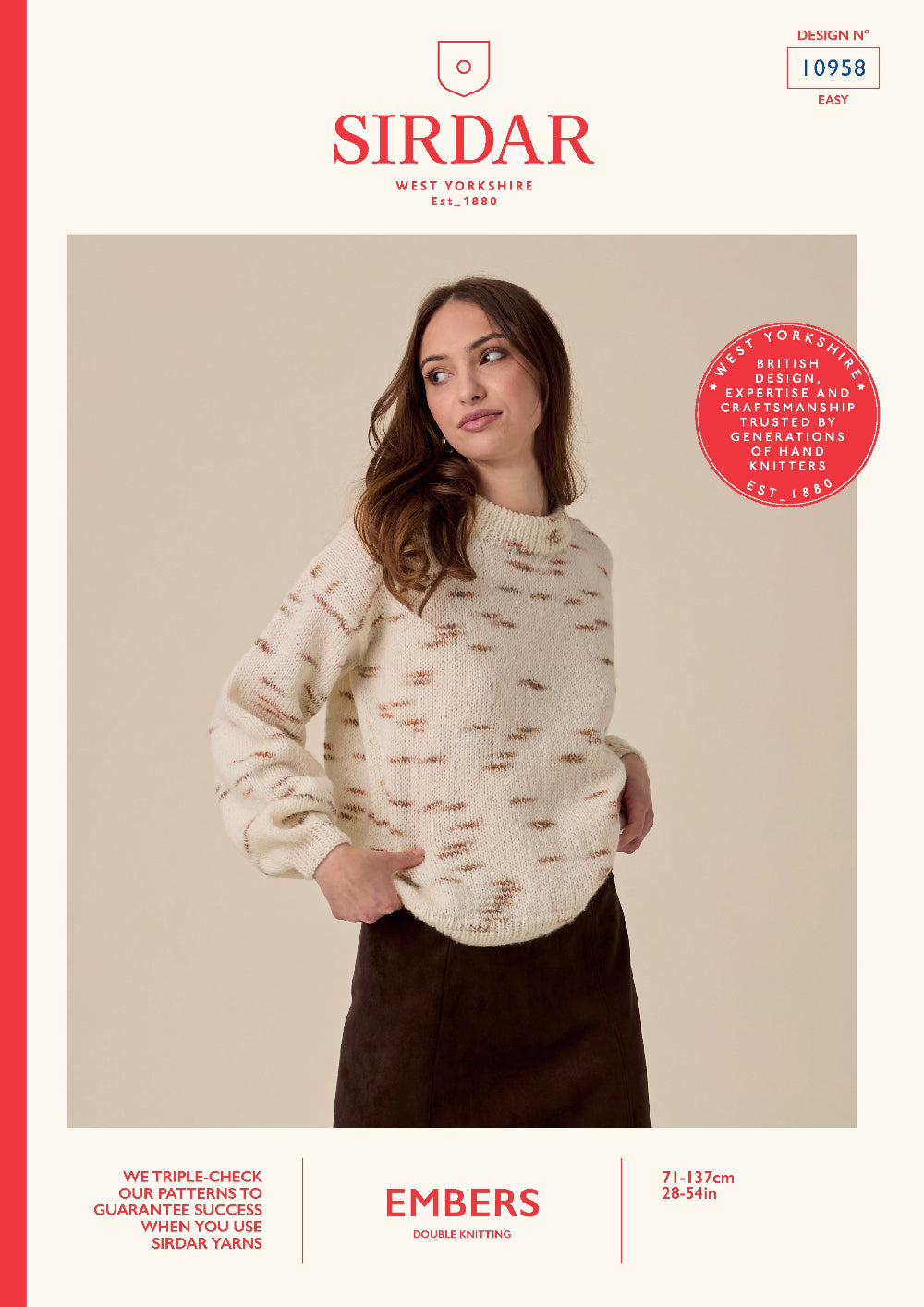 Sirdar knitting pattern cover for 'Embers' double knitting, showing a woman wearing a cream-colored knit sweater with small brown embroidered details. The cover features the Sirdar brand logo, design number 10958, and product color details.