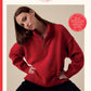 Sirdar West Yorkshire knitting pattern cover for 'Embers' double knitting, showing a woman wearing a red half-zip sweater with subtle blue and yellow flecks. The cover features the Sirdar brand logo, design number 10962, and product details on a cream background with red accents.