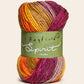 Multicolored skein of yarn with 'Hayfield Spirit' label on a beige background