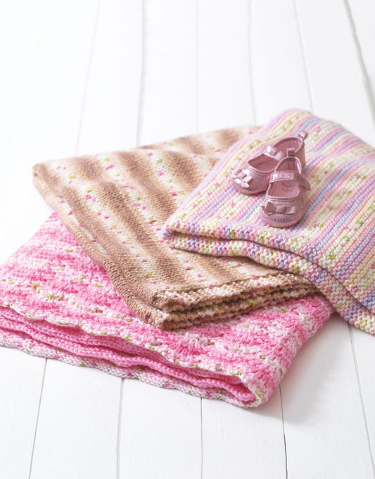 Knitting Pattern 4676 - BLANKETS IN HAYFIELD BABY BLOSSOM CHUNKY