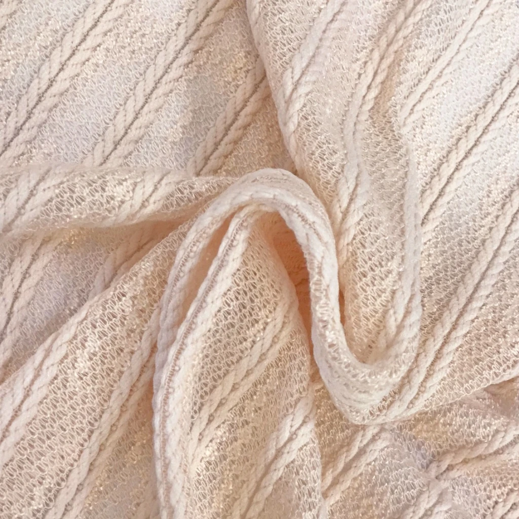 NUDE CABLE KNIT