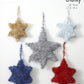Knitting Pattern 9106 - Tinsel Stars Knitted in Tinsel Chunky